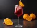 Ein erfrischender Gin-Drink mit Eis und Orangenscheiben, bereit zum Genießen.